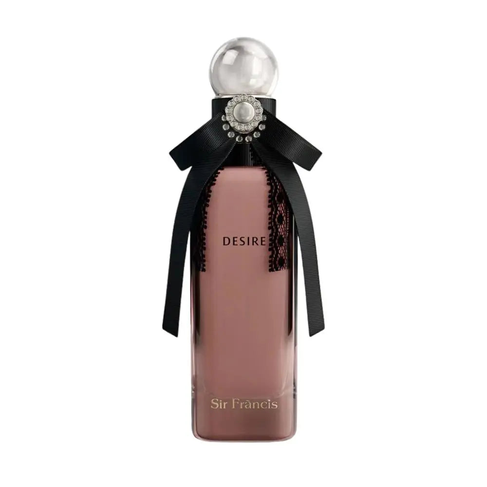A bottle of Sir Francis Desire perfume with a dusty rose pink body, a black ribbon bow, and a clear spherical cap on a white background.