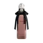 A bottle of Sir Francis Desire perfume with a dusty rose pink body, a black ribbon bow, and a clear spherical cap on a white background.