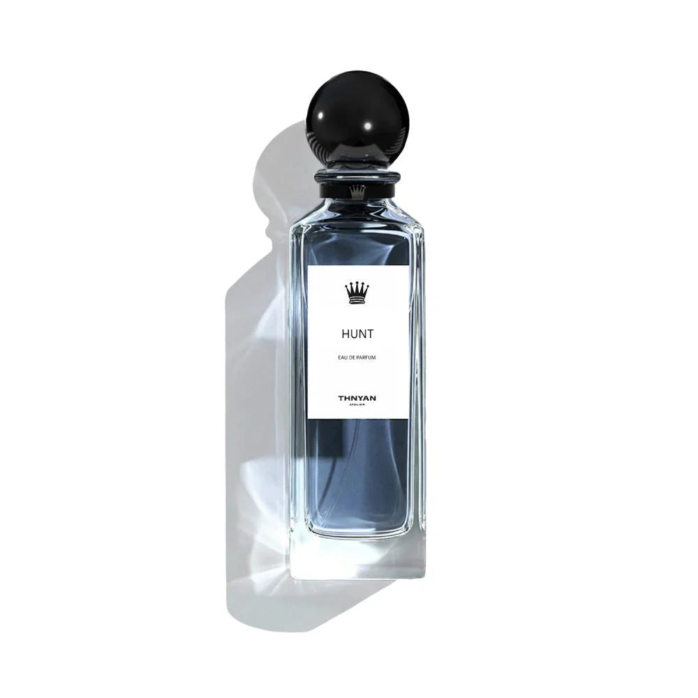 Hunt Perfume botlle on a white background