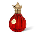 Khayal perfume in a red ribbed glass bottle with ornate gold cap on white background