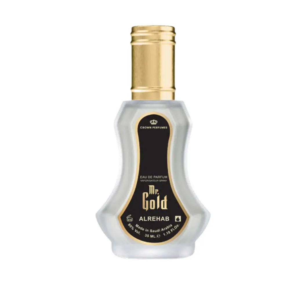 A bottle of Mr. Gold Alrehab Eau de Parfum by Crown Perfumes, featuring a clear glass bottle with a gold cap and a black and gold label.