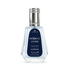 A faceted clear glass bottle of Alrehab Océano Eau de Parfum with a dark navy blue label and a silver metallic cap, set against a plain white background.