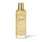 Oud Mirage perfume by ALREHAB in a gold cylindrical bottle on white background