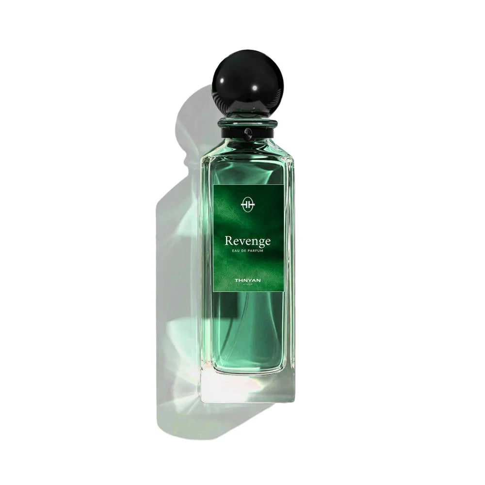 Revenge perfume bottle on a white background