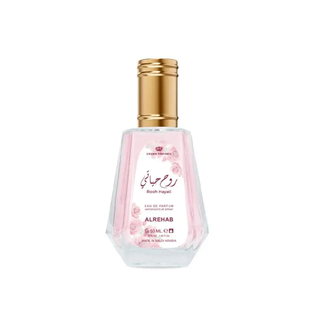 Rooh Hayati perfume by ALREHAB with pink fragrance and gold cap on white background