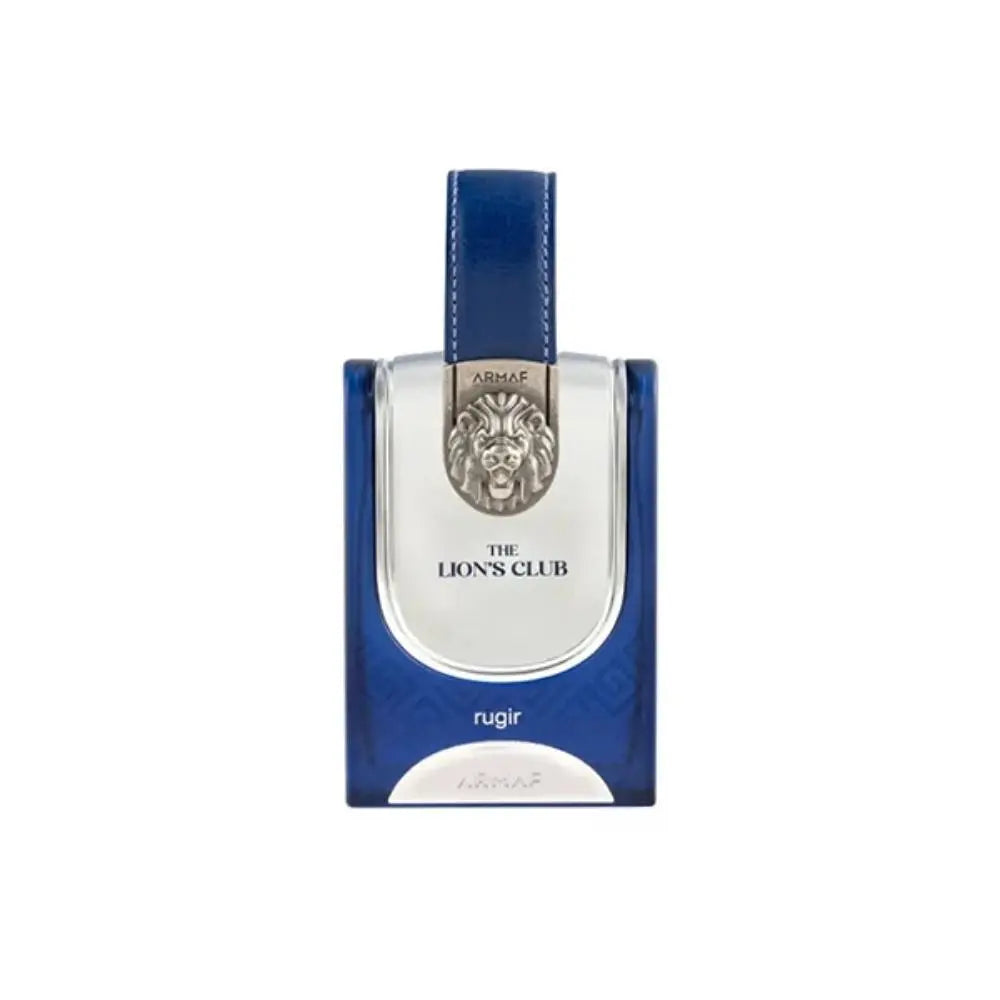 A blue and silver rectangular perfume bottle with a leather-like blue top handle, featuring a lion head emblem and the text 'THE LION'S CLUB' and 'rugir' on a plain white background.